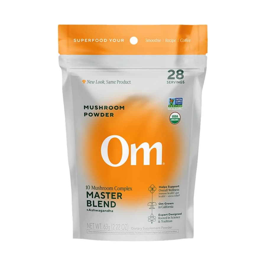 Orange and white Om Master Blend mushroom powder pouch.