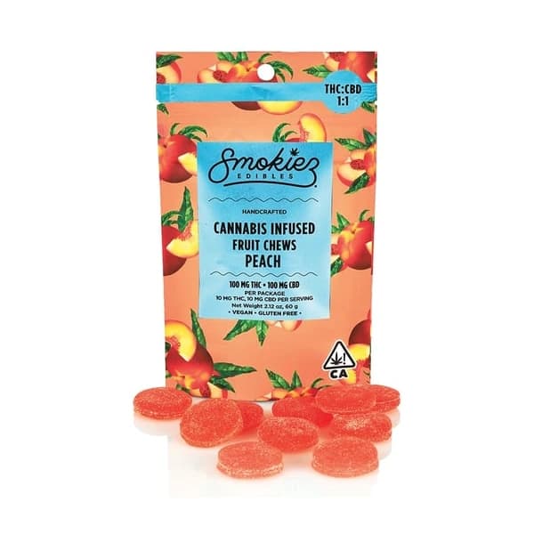 Smokiez Peach Fruit Chews pouch labelled THC:CBD 1:1 with peach-colored chews in front.